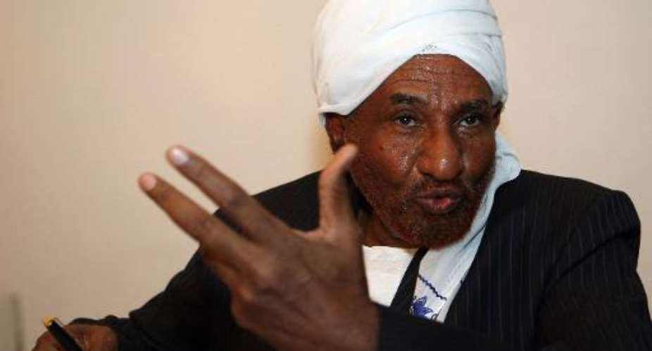 Sudanese political and religious leader Sadiq al-Mahdi, head of the Umma Party and Imam of the Sufi sect Ansar, holds a press conference in Cairo on April 2, 2009.  By Cris Bouroncle (AFP)