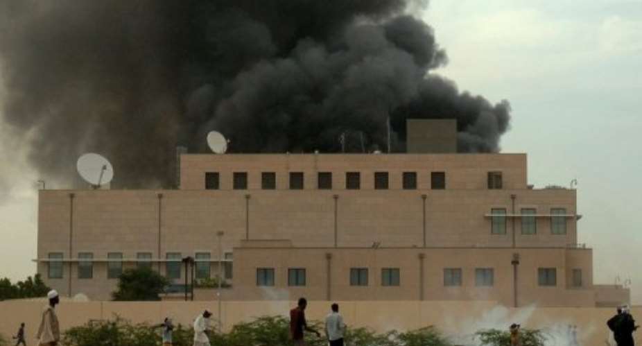 Smoke billows from the US embassy in Khartoum on September 14, 2012, during a protest against an amateur film.  By  AFPFile