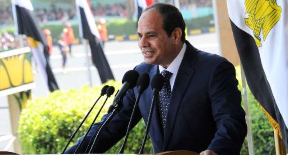 A picture released by the Egyptian Presidency on June 24, 2014 shows Egypt's President Abdel Fattah al-Sisi giving a speech during a military graduation ceremony in the capital Cairo.  By  AFP