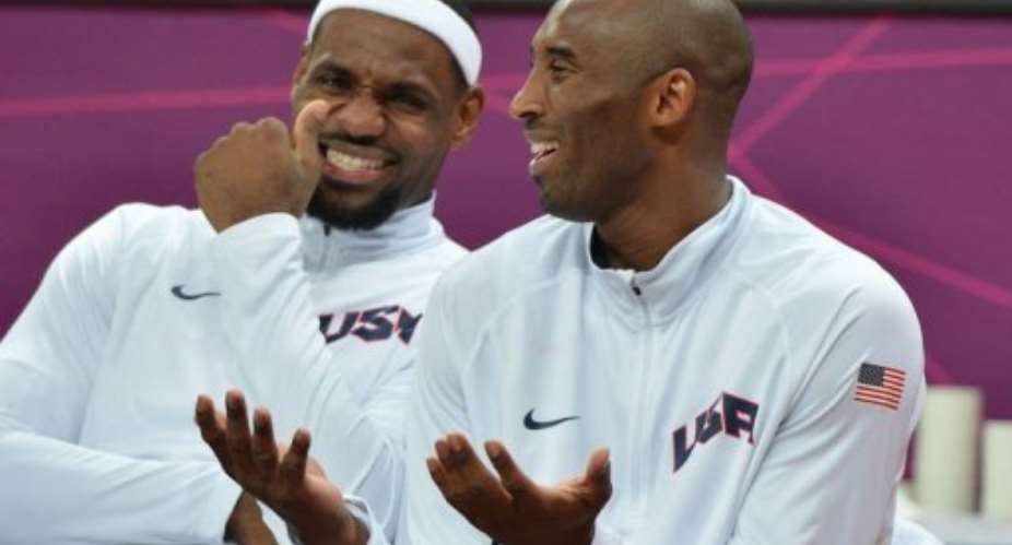 US forward LeBron James (L) chats with US guard Kobe Bryant (R).  By Mark Ralston (AFP)