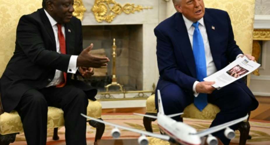 US President Donald Trump ambushed visiting South African President Cyril Ramaphosa with what he said was proof of genocide against white people.  By Jim WATSON (AFP)
