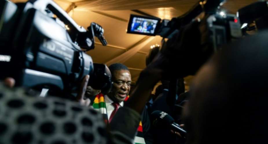 US President Donald Trump has prolonged sanctions on more than 100 individuals and entities from Zimbabwe including President Emmerson Mnangagwa, pictured, over rights abuses.  By Jekesai NJIKIZANA AFPFile
