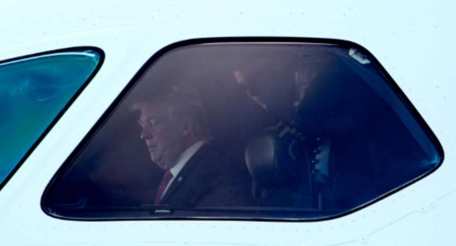 US President Donald Trump, pictured in the cockpit of a Boeing 787-10 Dreamliner in 2017, says he doesn't want Albert Einstein to be his pilot.  By NICHOLAS KAMM AFPFile