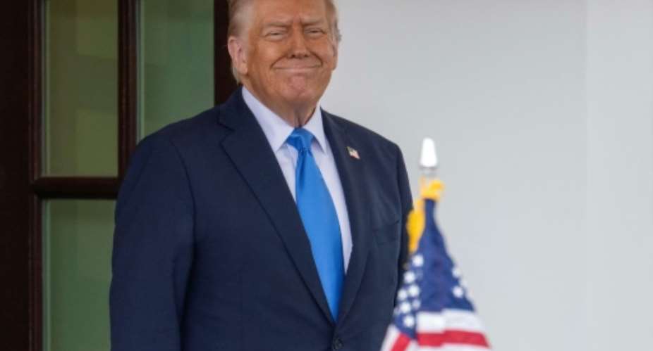 US President Donald Trump smiles at the White House.  By Jim WATSON (AFP)