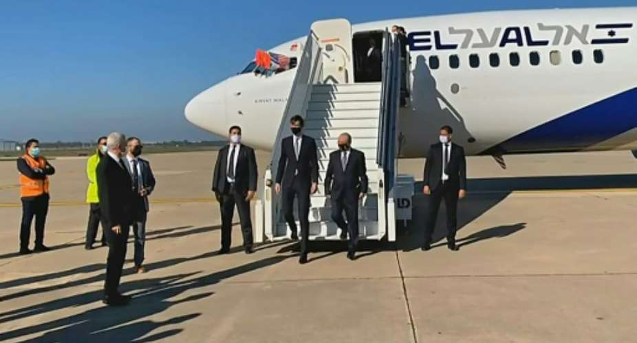 US President Donald Trump's son-in-law and advisor Jared Kushner L and Israeli National Security Advisor Meir Ben Shabbat leave the plane in Rabat.  By - US EMBASSY IN MOROCCOAFP