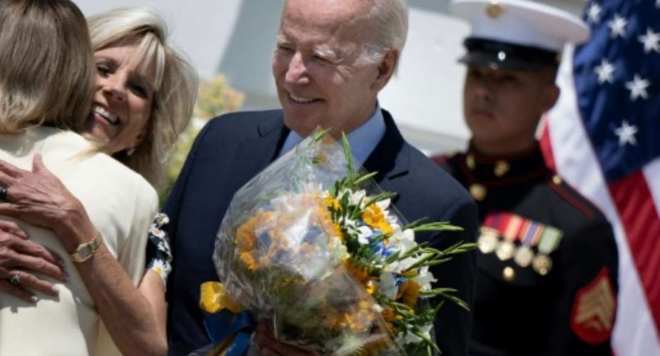 US President Joe Biden, seen welcoming Ukrainian First Lady Olena Zelenska to the White House, will hold a summit of African leaders in December 2022.  By Brendan Smialowski AFP