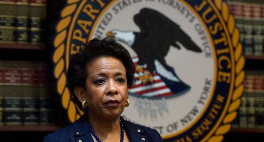 US Attorney General Loretta E. Lynch attends an announcment on charges against FIFA officials at a news conference on May 27, 2015 in New York.  By Don Emmert AFP