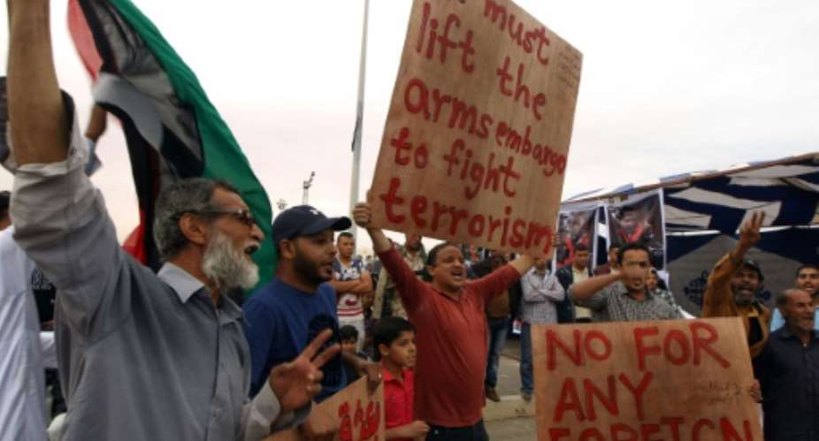 Libyans demonstrate in Benghazi calling for military forces to re-capture the southern city of Sirte from the Islamic State group without foreign intervention.  By Abdullah Doma AFPFile