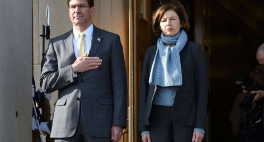 US Secretary of Defense Mark Esper welcomes France's Defence Minister Florence Parly during an honor cordon at the Pentagon.  By OLIVIER DOULIERY AFP