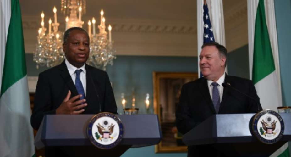 US Secretary of State Mike Pompeo and Nigerian Foreign Minister Geoffrey Onyeama deliver statements to the press after talks that included discussion of a visa row.  By Eric BARADAT AFP