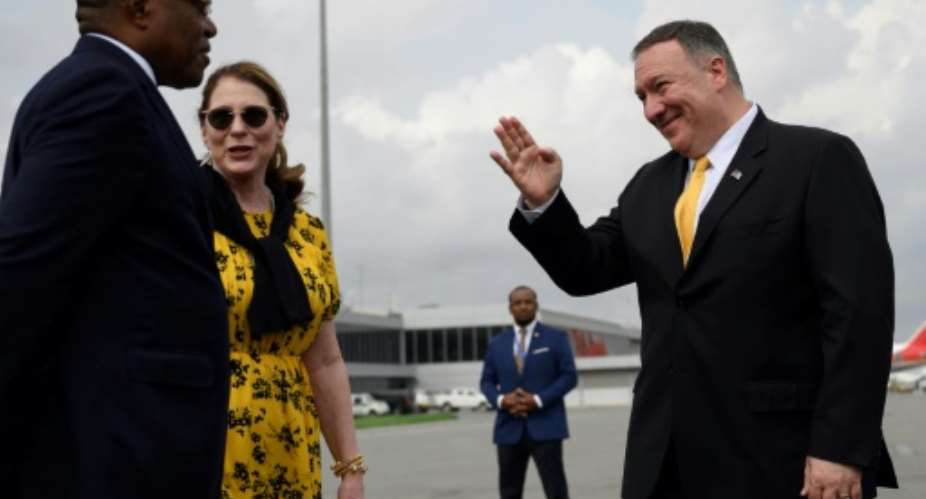 US Secretary of State, Mike Pompeo R, and his wife, Susan Pompeo C, travelled to Angola.  By ANDREW CABALLERO-REYNOLDS POOLAFP