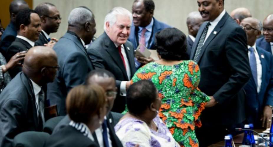 US Secretary of State Rex Tillerson greets participants during a meeting of African leaders at the State Department on November 17, 2017.  By Brendan Smialowski AFP