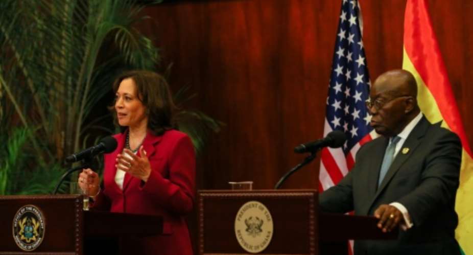 US Vice President Kamala Harris L announced security and economic assistence during a visit to Ghana's President Nana Akufo-Addo R.  By Nipah Dennis AFP