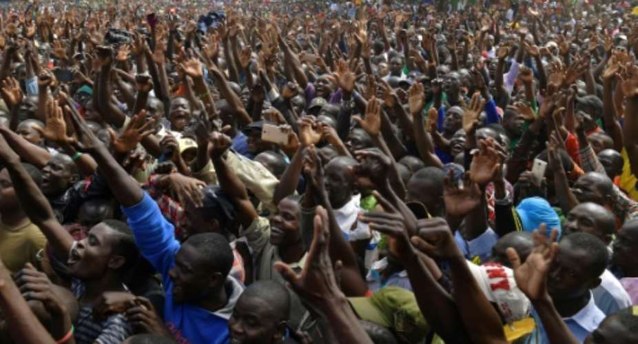 Vast crowds cheer Kenya's opposition leader Raila Odinga as he makes his first public comments since results showed him losing the August 8 presidential election.  By CARL DE SOUZA AFP