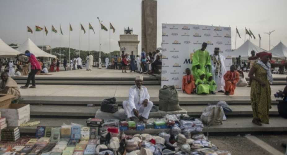 Vendors selling merchandise in Accra's Independence Square, part of the waterfront area earmarked for development.  By CRISTINA ALDEHUELA AFP
