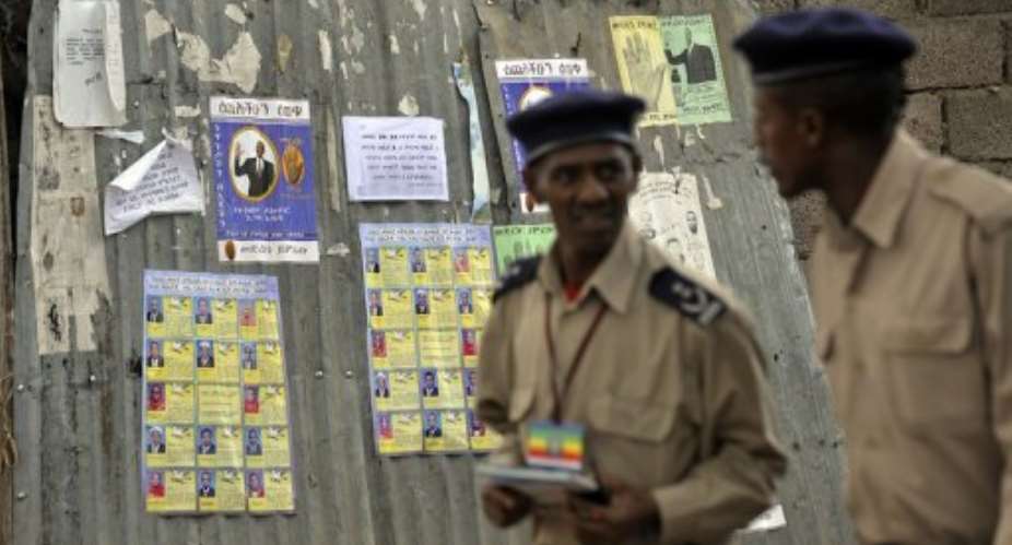 Ethiopian police officers patrol in Addis Ababa.  By Simon Maina (AFP/File)