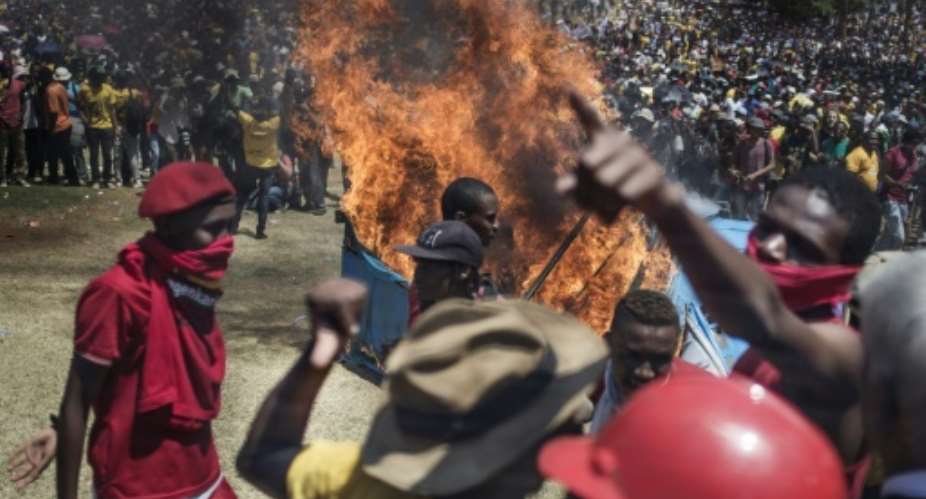 Violent protests erupted at many South African universities in October last year, with several campuses temporarily shut down and riot police clashing with students outside parliament.  By John Wessels AFPFile