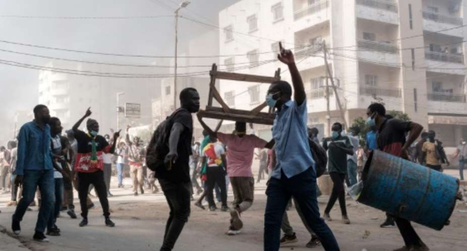 Violent protests have left three people dead.  By GUY PETERSON (AFP)