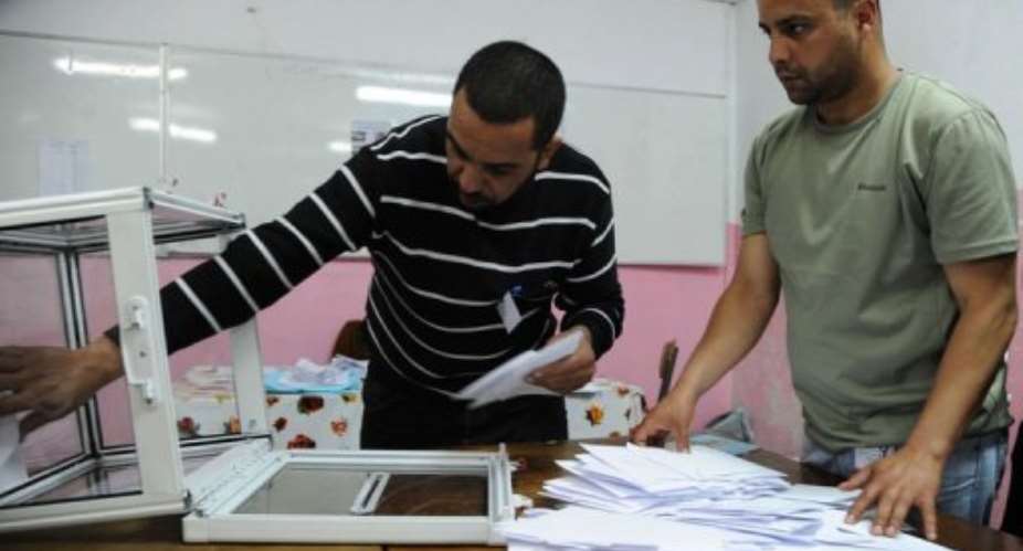 Officials start counting the votes  in Algiers.  By Farouk Batiche AFPFile