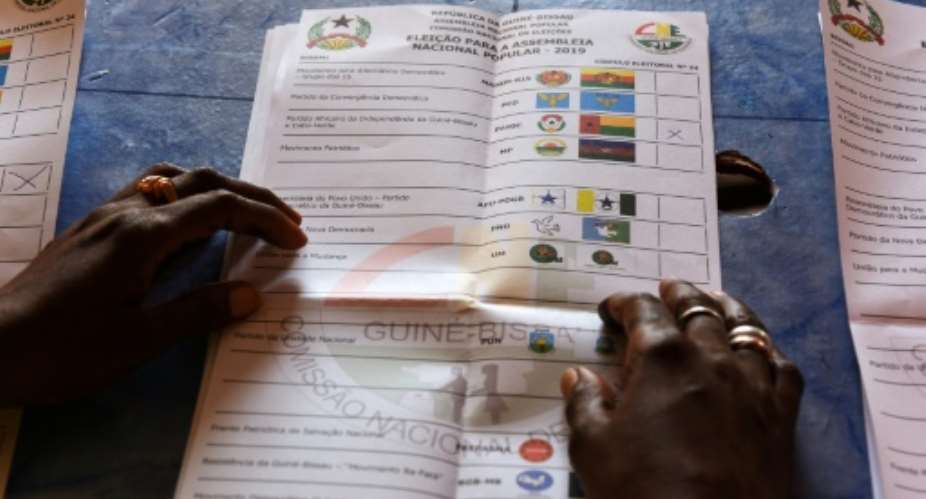 Voters in Guinea-Bissau cast ballots on March 10 to elect a new parliament hoping to end a leadership deadlock in a country renowned for drug trafficking and instability.  By SEYLLOU AFPFile