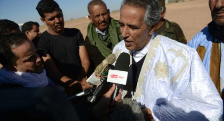 Ahmed Boukhari C, the Polisario Front's representative at the United Nations, speaks to the press after a meeting on March 5, 2016.  By Farouk Batiche AFPFile