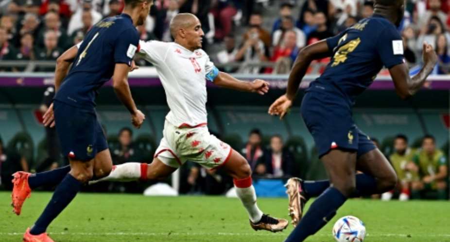 Wahbi Khazri scores for Tunisia against a much-changed France side.  By Anne-Christine POUJOULAT AFP