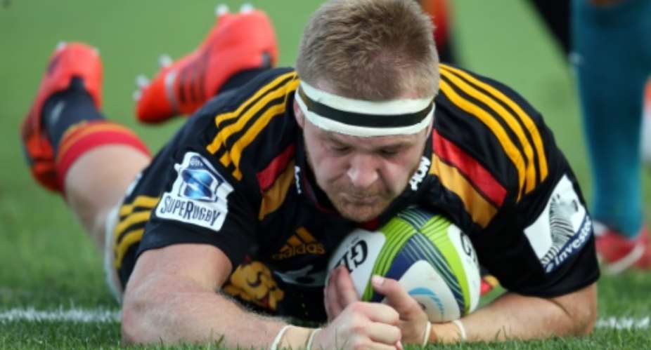 Waikato Chiefs captain Sam Cane dives in for a try during a Super Rugby match in Hamilton.  By Michael Bradley AFPFile