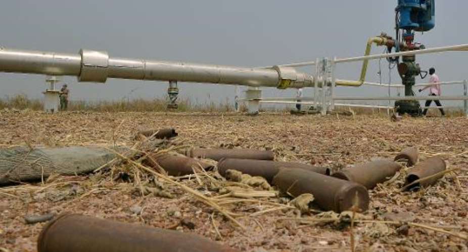 File picture shows spent munitions lying on the ground at an abandoned oil treatment facility at Thar Jath in Unity State, South Sudan.  By Tony Karumba AFPFile