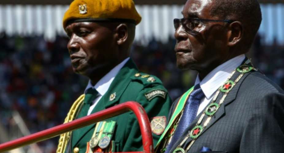 There has a surge of public anger against Zimbabwe President Robert Mugabe, triggered by an economic crisis that has left banks short of cash and the government struggling to pay its workers.  By Jekesai Njikizana AFPFile