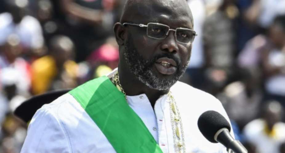 Weah's inauguration in January 2018 marked Liberia's first transition between democratically-elected leaders since 1944.  By ISSOUF SANOGO AFP