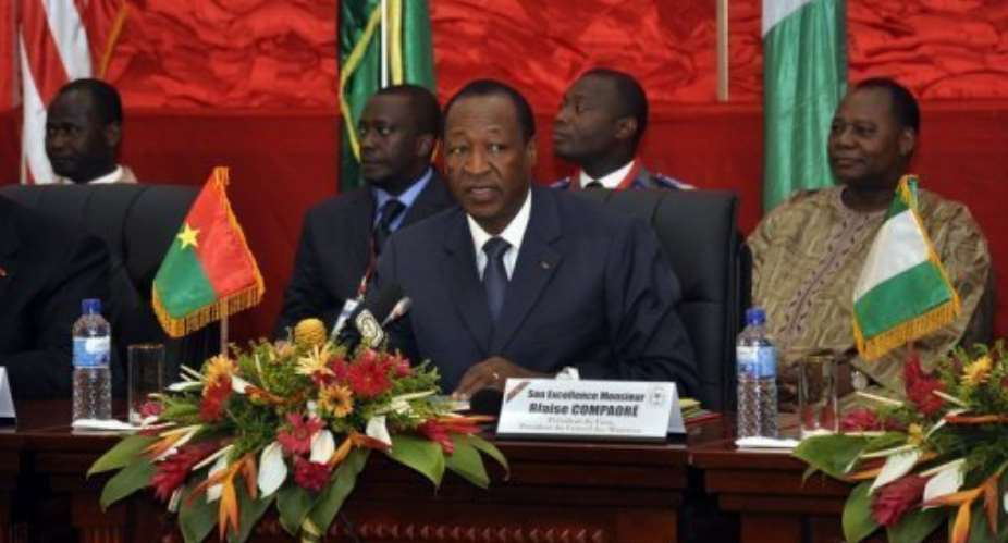 The president of Burkina Faso Blaise Compaore speaks during talks on Mali.  By Ahmed Ouoba AFP