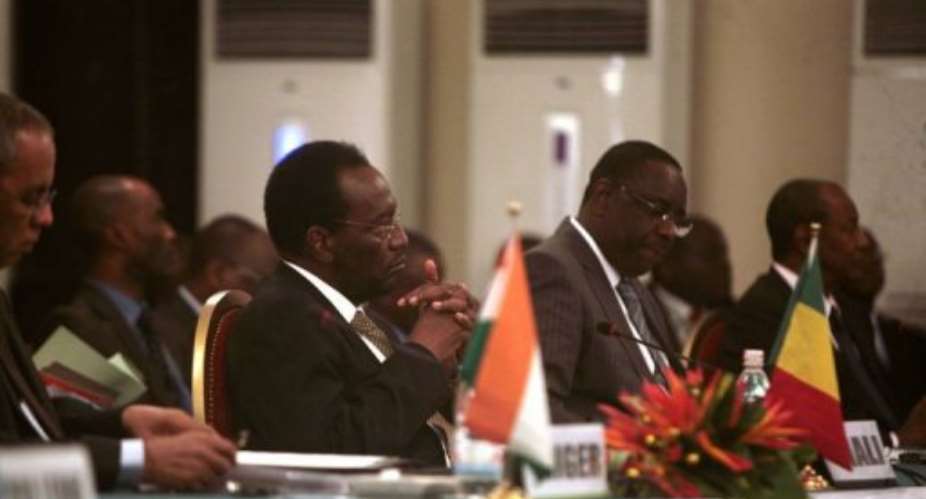 Mali's interim president Dioncouda Traore left and Senegalese President Macky Sall at the meeting.  By Herve Sevi AFP
