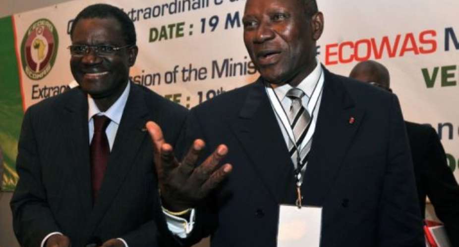 Ivory Coast foreign Minister Daniel Kablan Duncan (R) and Kadre Desire Ouedraogo (L), president of ECOWAS.  By Issouf Sanogo (AFP)
