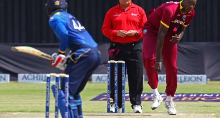 West Indies captain Jason Holder in action against Sri Lanka at Harare Sports Club on November 16 2016.  By Jekesai Njikizana AFP