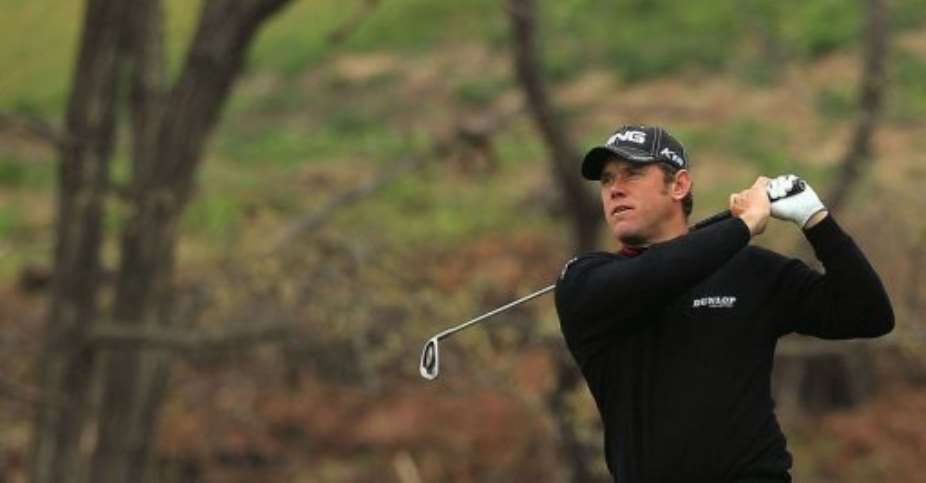 Westwood became the sixth golfer to successfully defend the title.  By Paul Lakatos AFPHOFile