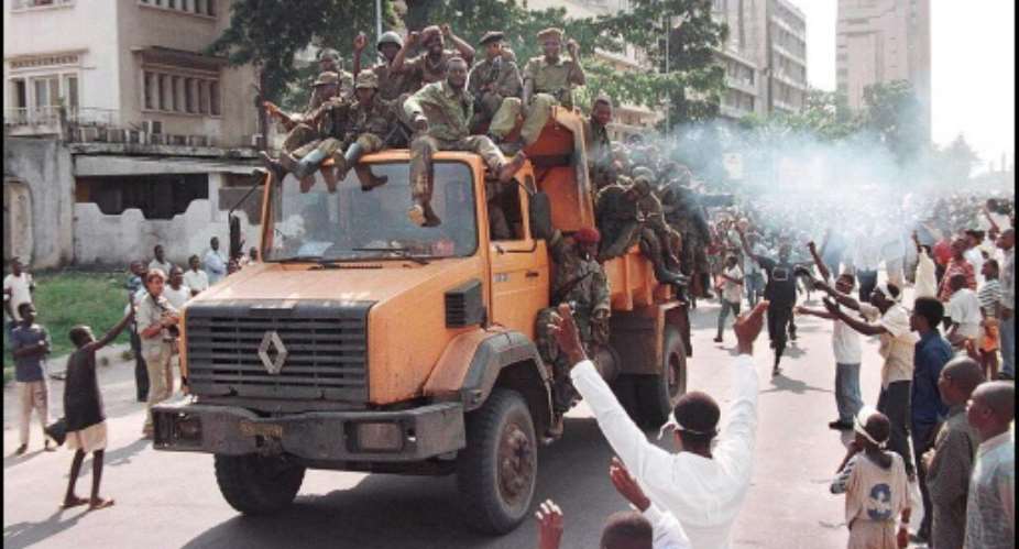 When Laurent-Desire Kabilas Alliance rebel troops entered Kinshasa on May 17, 1997, they were hailed by the people as liberators.  By PASCAL GUYOT (AFP/File)