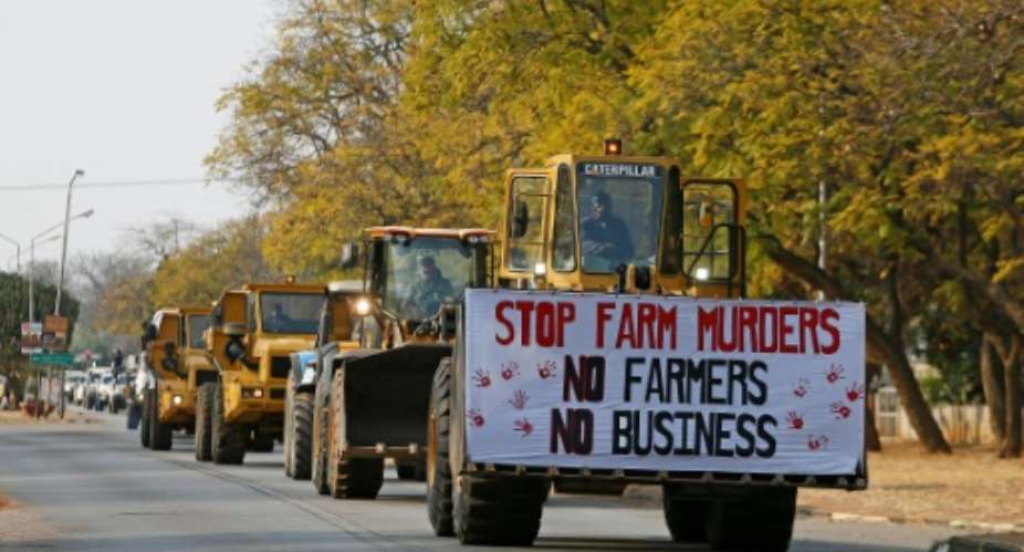 White farmers and their supporters have in recent months staged protests across the country against a spike in assaults and murders on farms..  By Phill Magakoe AFP