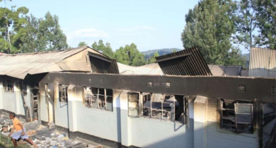 A burnt-out dormitory building at Itiero boys high school in Kenya's Kisii county, set on fire by students during a night of unrest.  By  AFP