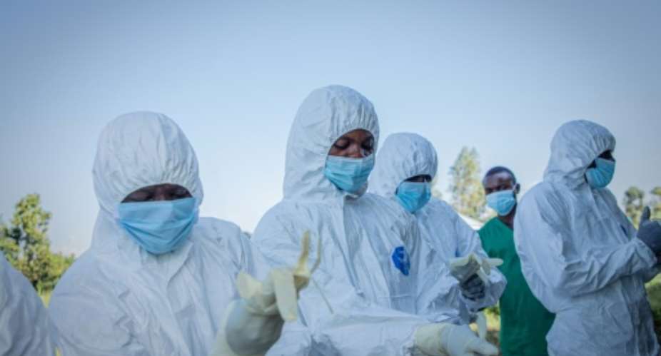 WHO warned that we are still playing catch-up in containing the Ebola outbreak in the Democratic Republic of Congo.  By Benediction MURHABAZI (AFP/File)