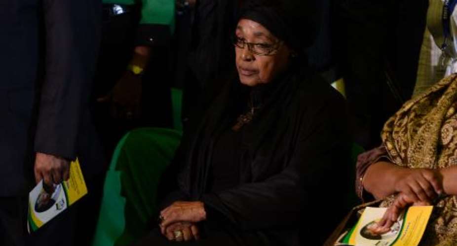 The ex-wife of Nelson Mandela, Winnie Madikizela-Mandela, attends a Farewell Service for the former South African president on December 14, 2013 at the Waterkloof air force base in Pretoria, South Africa.  By Stephane de Sakutin AFPFile