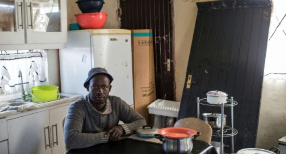 With gold losing its shine, short-term labour agreements have left workers like Gugu Malatse, 33, earning far less money than when permanent employees.  By WIKUS DE WET AFP