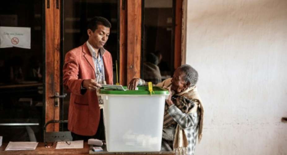 With the personalities of the two main candidates dominating the Madagascar election, issues such as poverty and corruption have been largely pushed aside.  By GIANLUIGI GUERCIA (AFP)