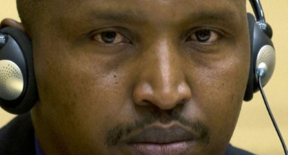 Rwandan-born Congolese warlord Bosco Ntaganda is seen during his first appearance before judges of the International Criminal Court in The Hague, on March 26, 2013.  By Peter Dejong POOLAFPFile