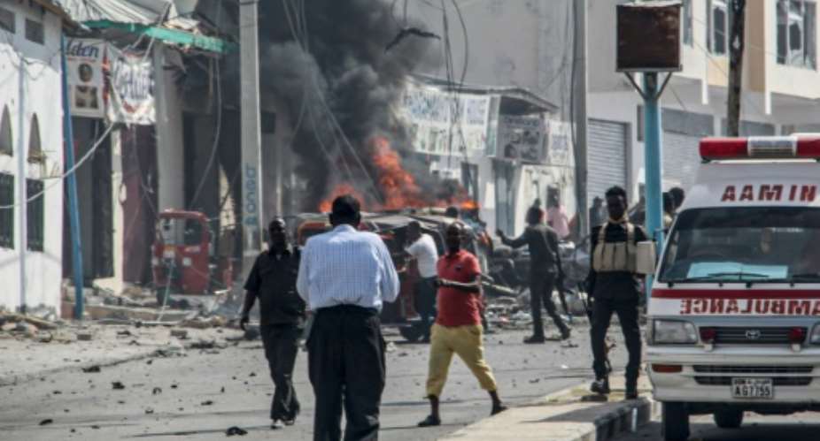 Witnesses said they heard gunfire and saw vehicles scatter before the heavy blast occurred.  By STRINGER (AFP)