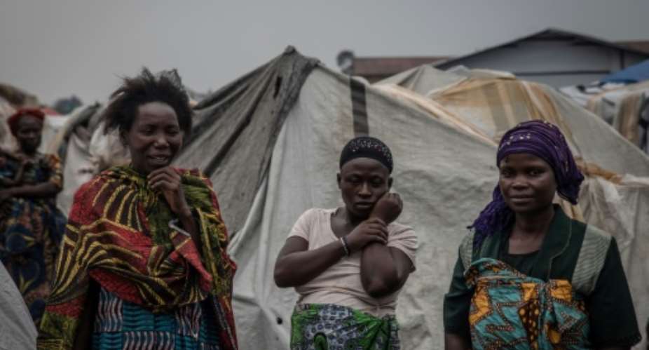 Women at the Kayembe displaced people's camp.  By Guerchom NDEBO AFP
