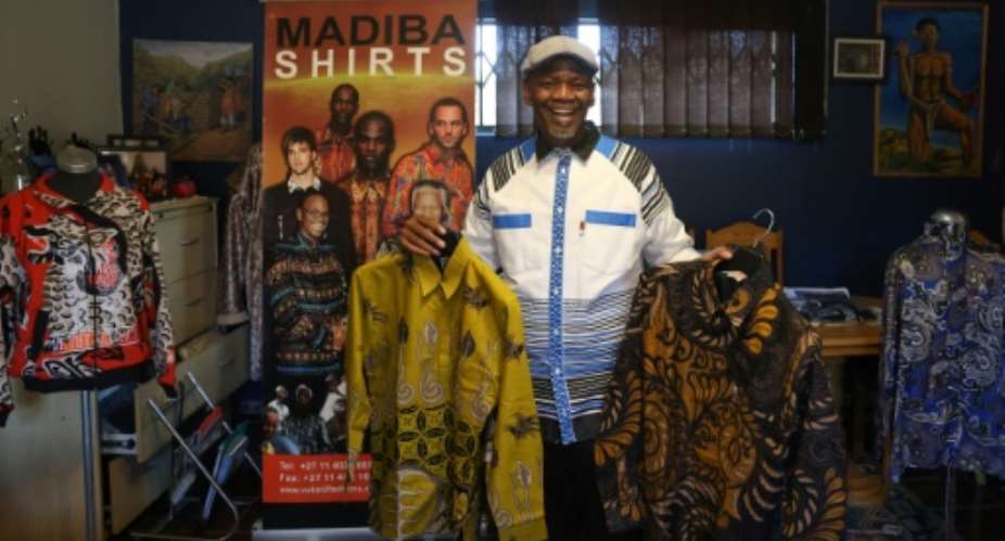 Worn untucked and without a jacket, Madiba shirts are still a favourite among South African politicians and feature at most occasions that make television news..  By Phill Magakoe (AFP)