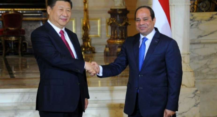 Chinese President Xi Jinping left held talks with Egypt's President Abdel Fattah al-Sisiand was to address the Cairo-based Arab League.  By Egyptian presidency. Photo  HO Egyptian PresidencyAFP
