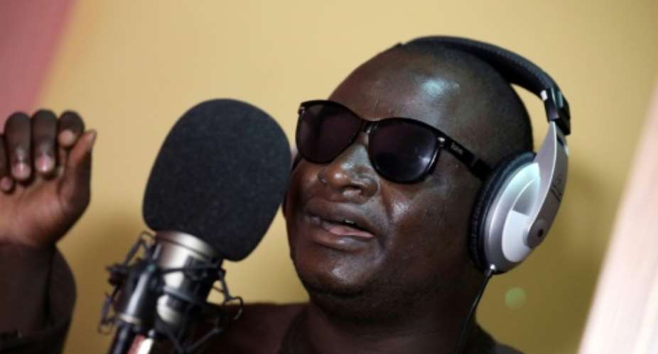 Yahaya Usman, popularly called Yahaya Makaho, faced years of discrimination before a wealthy fan funded a recording session for him three years ago.  By Kola Sulaimon AFP