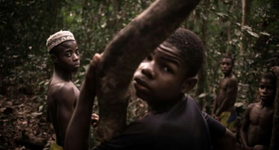 Young Bayaka Pygmies set up camp in the Dzanga-Sangha reserve in March.  By FLORENT VERGNES AFPFile