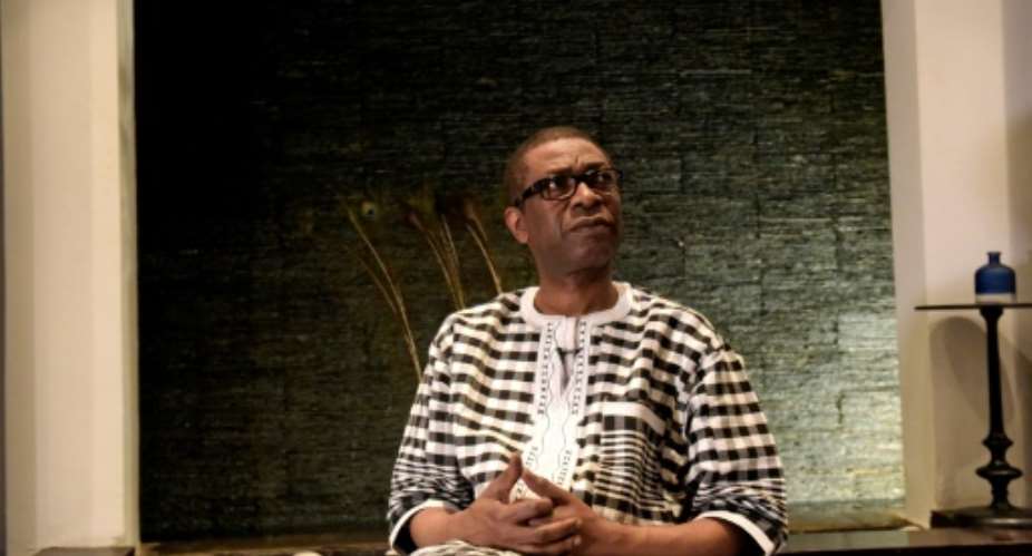 Youssou Ndour is backing a new 32 million initiative to combat malaria in Senegal.  By SEYLLOU AFP